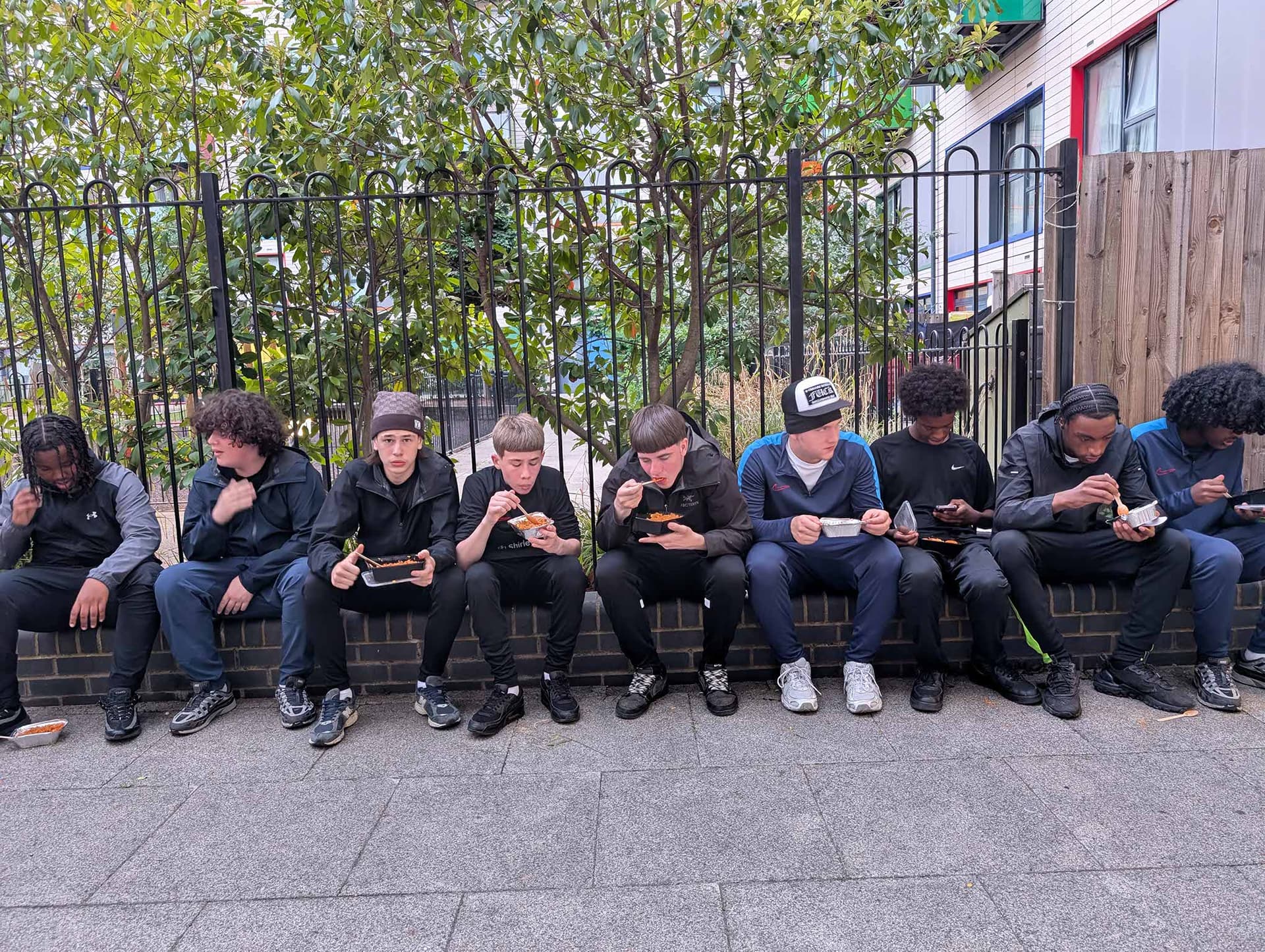 Students enjoying their cooked meals